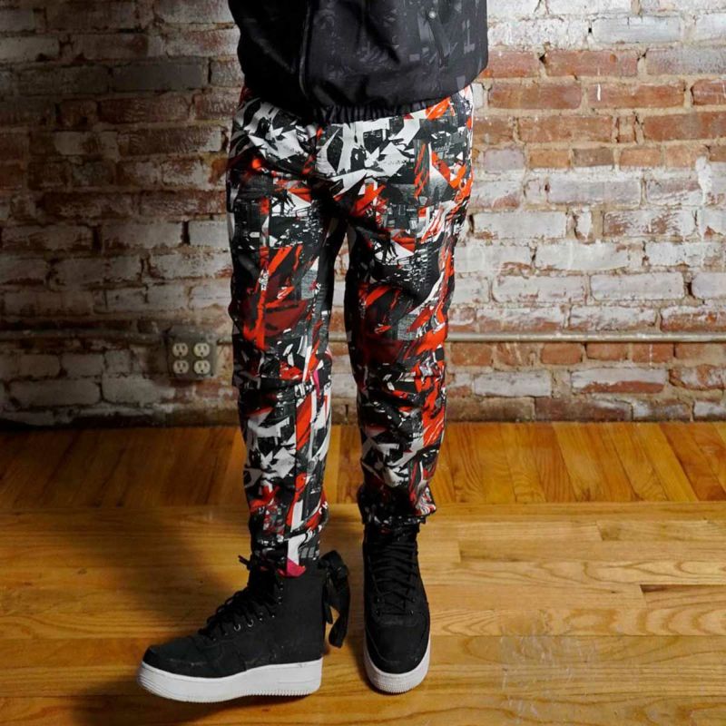 ルコックスポルティフ×チャリアンドコー TEAM WIND PANTS(RED)